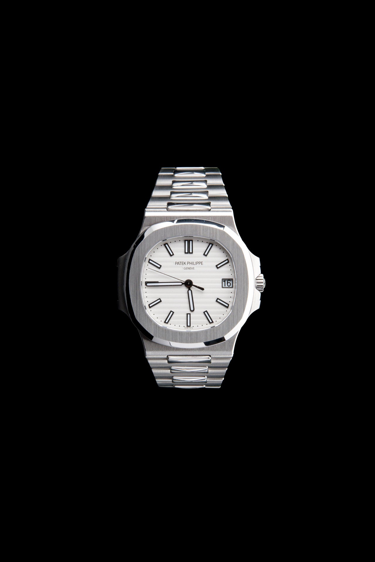 Silver watch with a white face on a black background